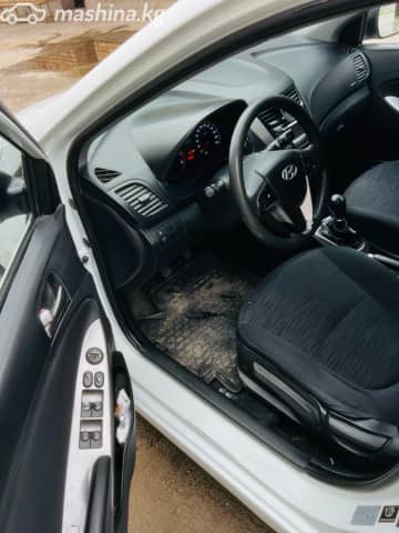 Hyundai Solaris I Рестайлинг 1.4 MT