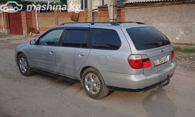 Nissan Primera II (P11) Рестайлинг 1.8 MT
