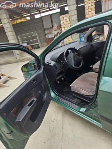 Hyundai Getz I Рестайлинг 1.1 MT