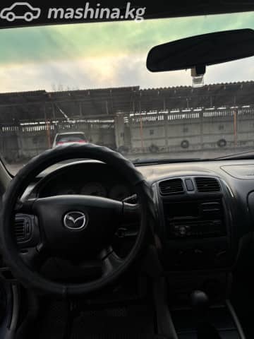 Mazda 323 VI (BJ) Рестайлинг 1.6 MT