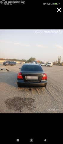 Chevrolet Aveo I Рестайлинг 1.2 MT