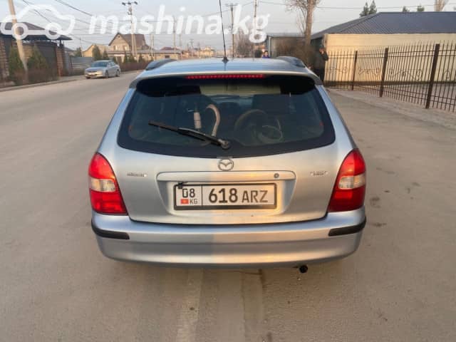 Mazda 323 VI (BJ) Рестайлинг 1.6 MT